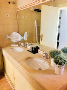 Un baño de Sea Breeze Golf & Beach Villa