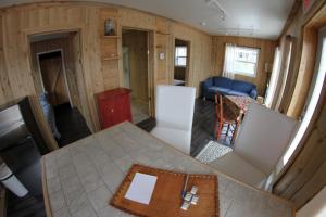 an aerial view of a kitchen and living room in a tiny house at Tadou-Shack in Tadoussac