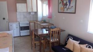 A kitchen or kitchenette at Chris Apartment