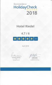 תעודה, פרס, שלט או מסמך אחר המוצג ב-Hotel Riedel