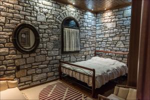 Krevet ili kreveti u jedinici u okviru objekta Stone Mansion Anavryti, ΑΜΑ 20569