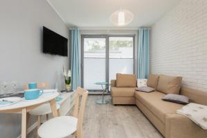 Predel za sedenje v nastanitvi Villa Ula Apartament