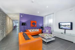 A seating area at Hotel Residence Hibiscus