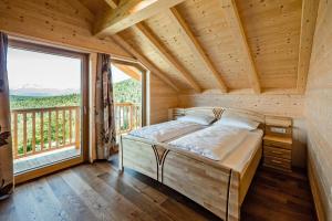 A bed or beds in a room at Camping Chalet Salten