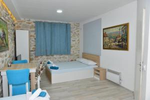 Ένα ή περισσότερα κρεβάτια σε δωμάτιο στο Rooms Ela Ela