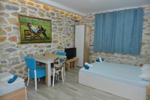 Ένα ή περισσότερα κρεβάτια σε δωμάτιο στο Rooms Ela Ela