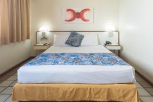 Cama ou camas em um quarto em Hotel Dan Inn Mar Piedade - Grande Recife