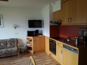 A kitchen or kitchenette at Haus Salzachblick