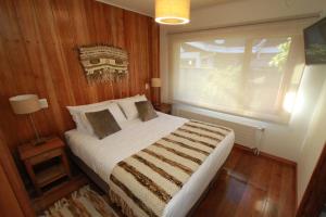 Cama ou camas em um quarto em Patagonia Route B&B