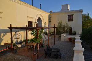 En balkon eller terrasse på Casa del Tejedor