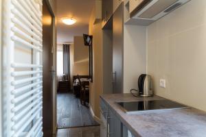 Una cocina o kitchenette en Apartamenty Koba