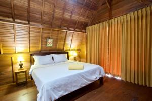 Letto o letti in una camera di Nusa Penida Pudak Nature Bungalow