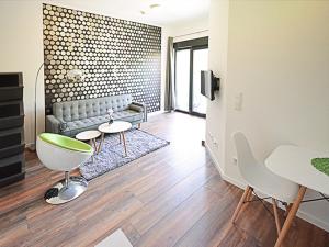 Зона вітальні в Eco Smart Apartments Erlangen