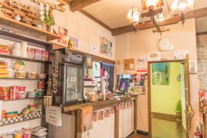 a grocery store with a counter in a room at Nikko Park Lodge Mountain Side in Nikko