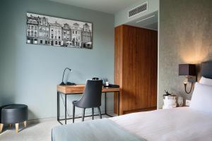 Кровать или кровати в номере Focus Hotel Poznań