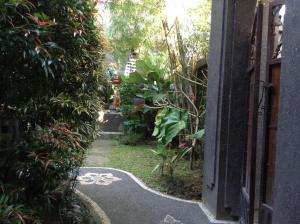 Jardí fora de Uma Taman House