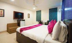 HOTEL DAKHA INTERNATIONAL - Karol Bagh, New Delhiにあるベッド