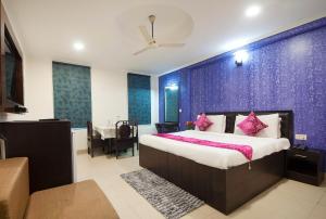 HOTEL DAKHA INTERNATIONAL - Karol Bagh, New Delhiにあるベッド