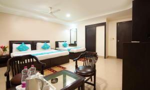 HOTEL DAKHA INTERNATIONAL - Karol Bagh, New Delhiにあるベッド