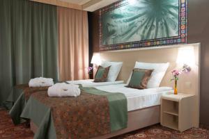 เตียงในห้องที่ Hotel Klimczok Resort&Spa