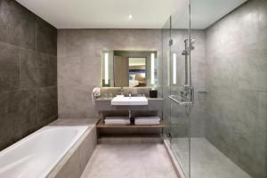 A bathroom at Novotel Jakarta Mangga Dua Square