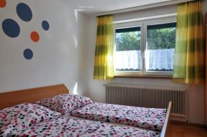 Een bed of bedden in een kamer bij Ferienhaus Steyrdurchbruch