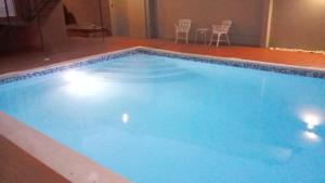 Piscina a Apart Hotel Turey o a prop