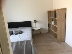 B&B Apartment Rødekro tesisinde bir odada yatak veya yataklar