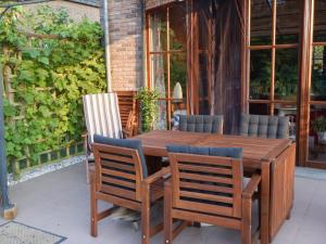 A patio or other outdoor area at B&B La Chrysalide