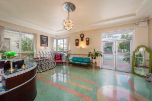 a large living room with a lobby with a lobby at Century Hotel in Miami Beach