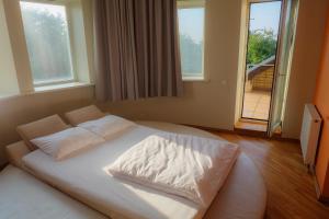 Cama ou camas em um quarto em A&L private rooms in Kaunas