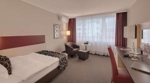 Postelja oz. postelje v sobi nastanitve Best Western Hotel Darmstadt Mitte