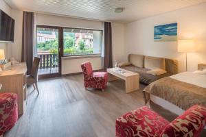 Krevet ili kreveti u jedinici u objektu Best Western Plus Schwarzwald Residenz