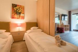 Krevet ili kreveti u jedinici u objektu Best Western Plus Schwarzwald Residenz