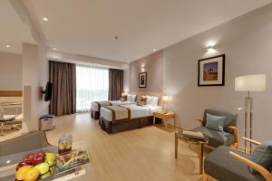 Ліжко або ліжка в номері UK 27 The Fern, Belagavi