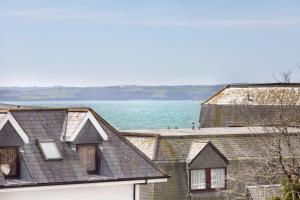 a view of the water from the roofs of houses at The Lerryn in Falmouth