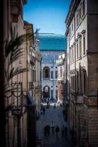 a group of people walking down a street at Mi&Ti Bed&Breakfast in Vicenza