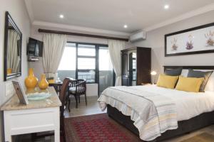 Posteľ alebo postele v izbe v ubytovaní Hillside Guesthouse Umhlanga