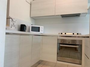 A cozinha ou kitchenette de Appartamento Atlantis