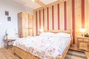 Krevet ili kreveti u jedinici u okviru objekta Apartamenty Rockus LUX & SPA Zakopane