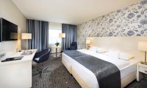 Maritim Hotel Bonn में एक कमरे में एक या कई बेड