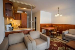 Svetainės erdvė apgyvendinimo įstaigoje Luxury Apartment Hotel Siófok