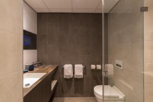 Postillion Hotel Amsterdam tesisinde bir banyo