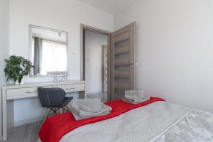 מיטה או מיטות בחדר ב-Apartament Metropolia typu deluxe, free WiFi, FV