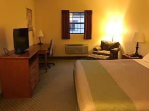 A television and/or entertainment centre at Motel 6-Bloomsburg, PA