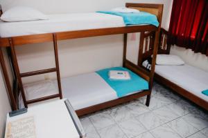 Una cama o camas en una habitación de Hotel Lumem Taguatinga Sul