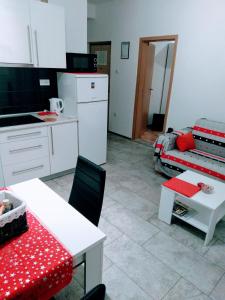 A kitchen or kitchenette at Apartment Citadela