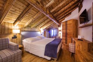 Letto o letti in una camera di Hotel Pilier D'Angle & Wellness