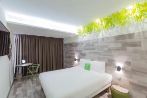 Vuode tai vuoteita majoituspaikassa Ibis Styles Lisboa Centro Marquês de Pombal