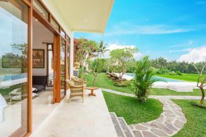 Aed väljaspool majutusasutust Champaca Luxury Villas Ubud